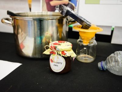 a table with the tools needed to make jam