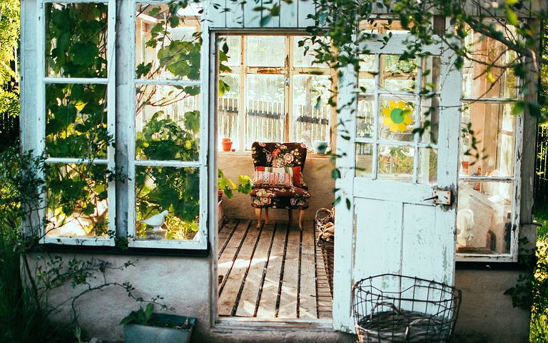 antique chair in a sunroom