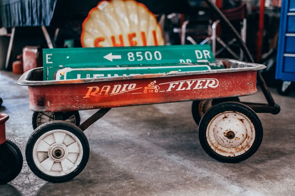 rusted vintage red wagon cart