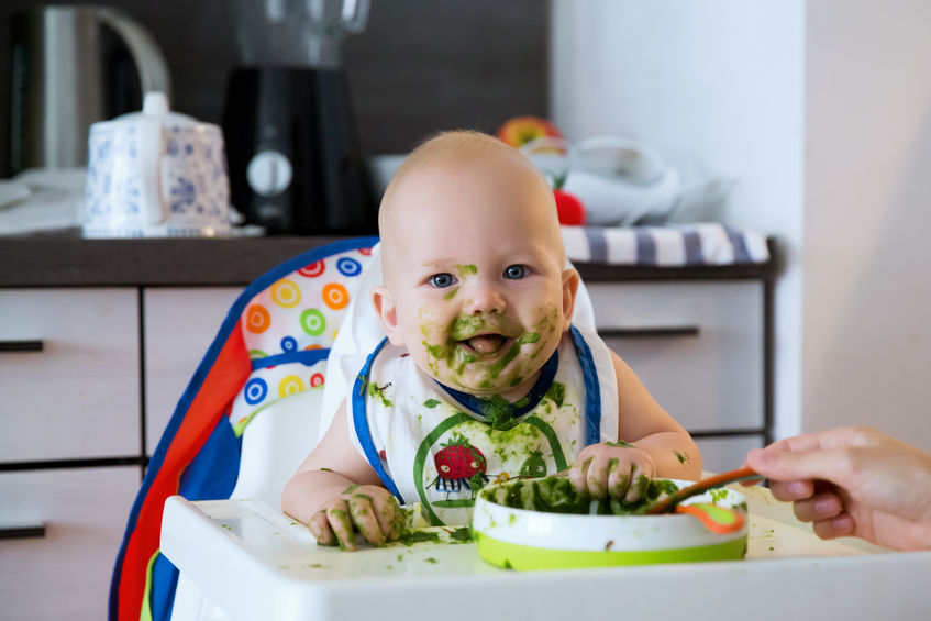 messy baby with food on face